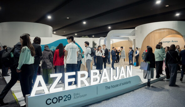 A sign at COP29 highlighting the event is held at Azerbaijan