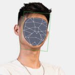 A young man with a digital cutout covering his face.